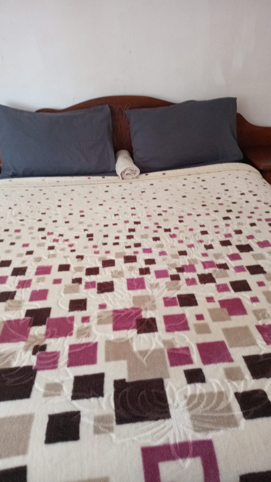 Room with patterned bedding